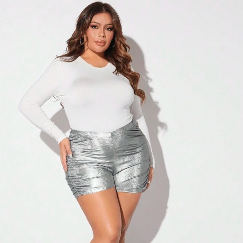Silver snake print shorts